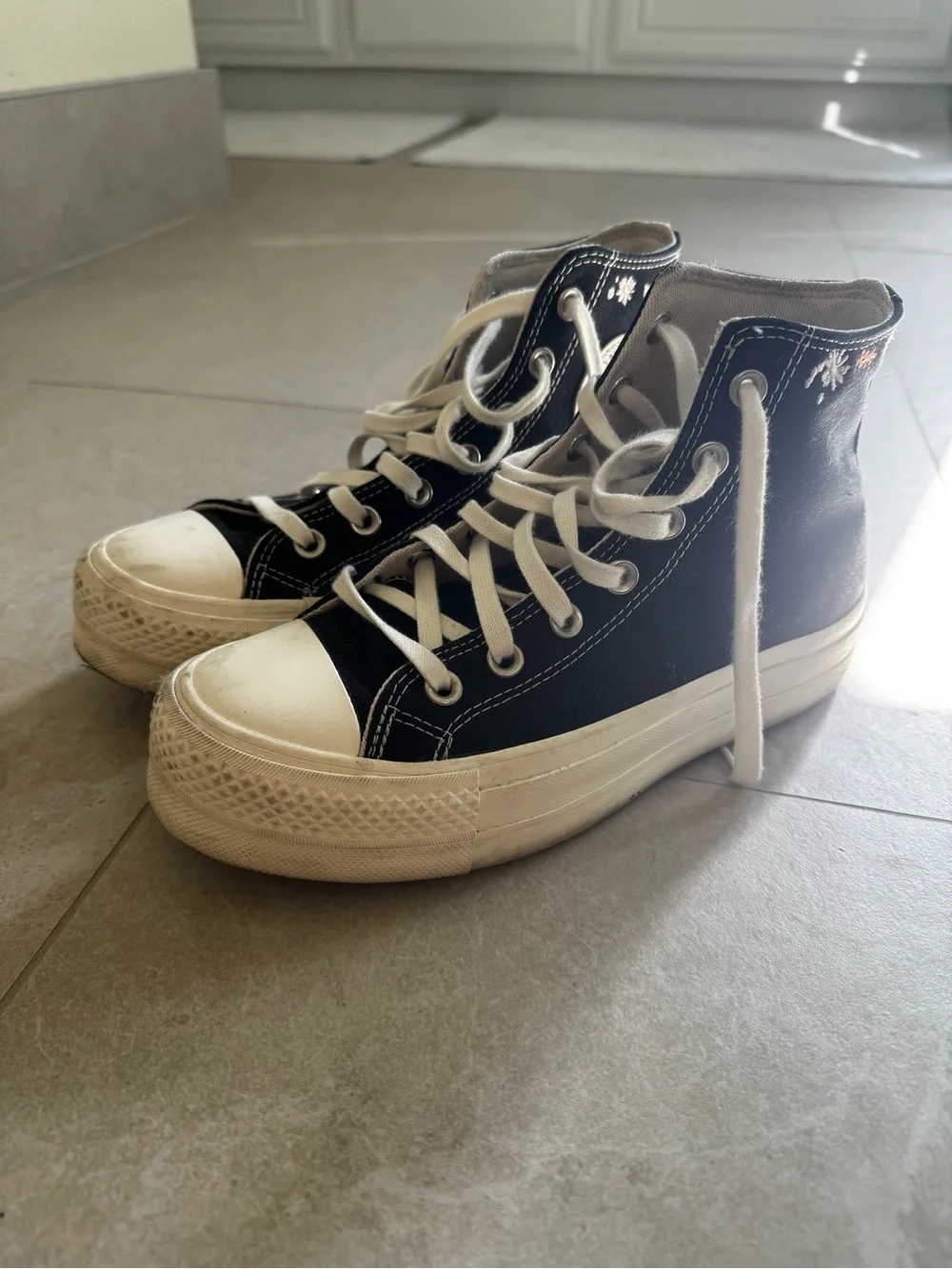 Black High-Top Canvas Sneakers with White Laces and Subtle Floral Embroidery